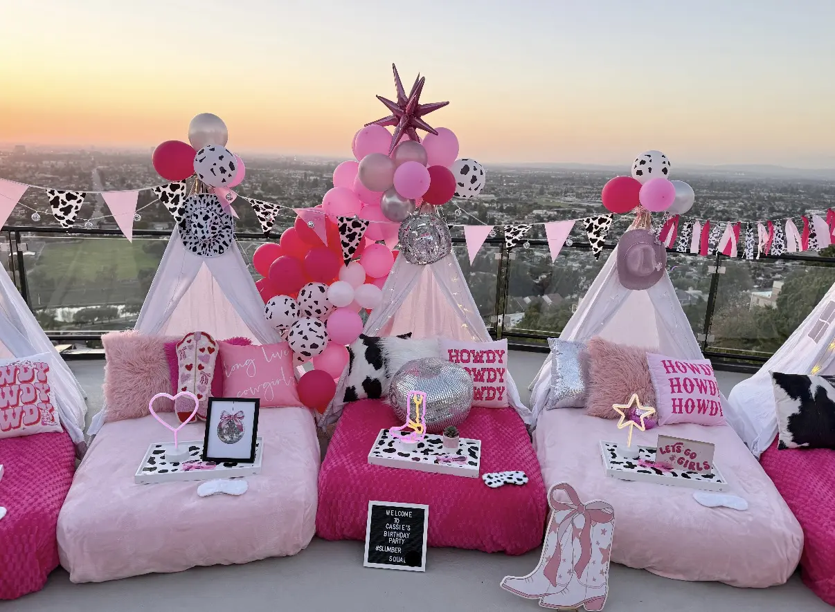 Pink cow-print rooftop slumber party tents