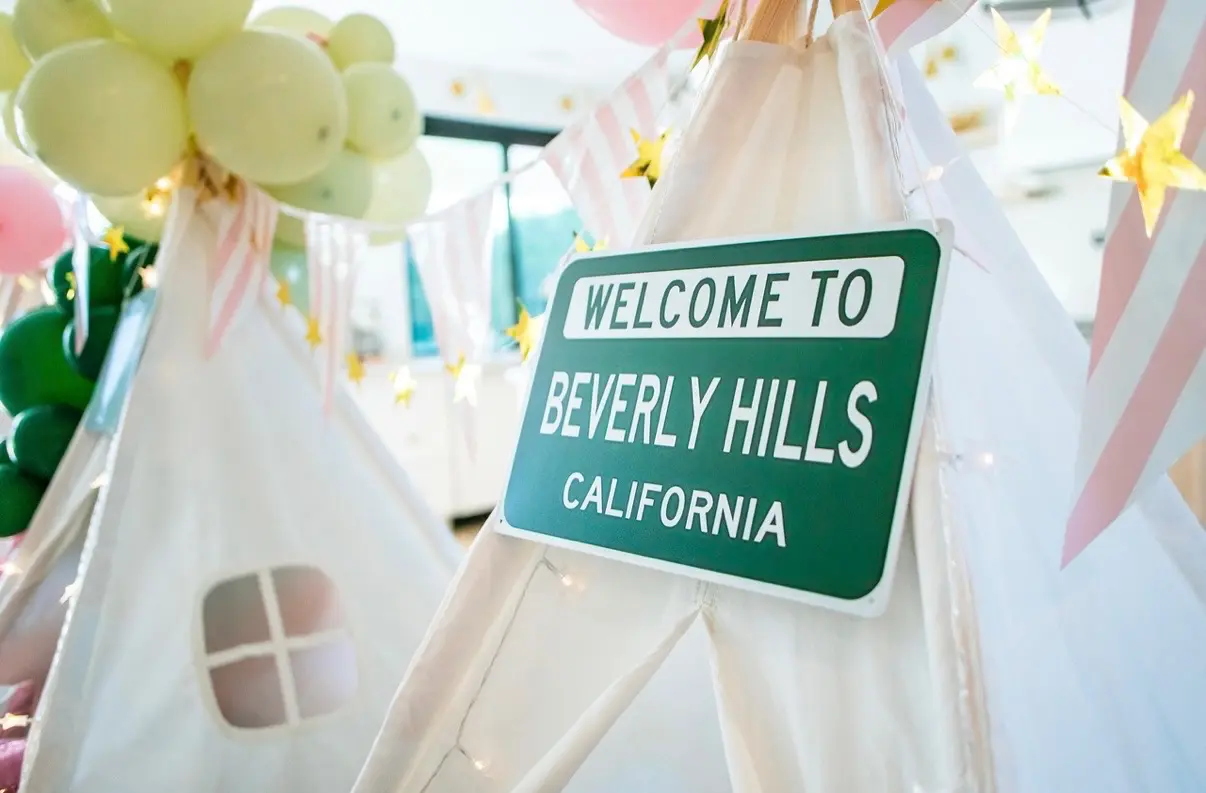 Beverly Hills welcome sign on party teepee