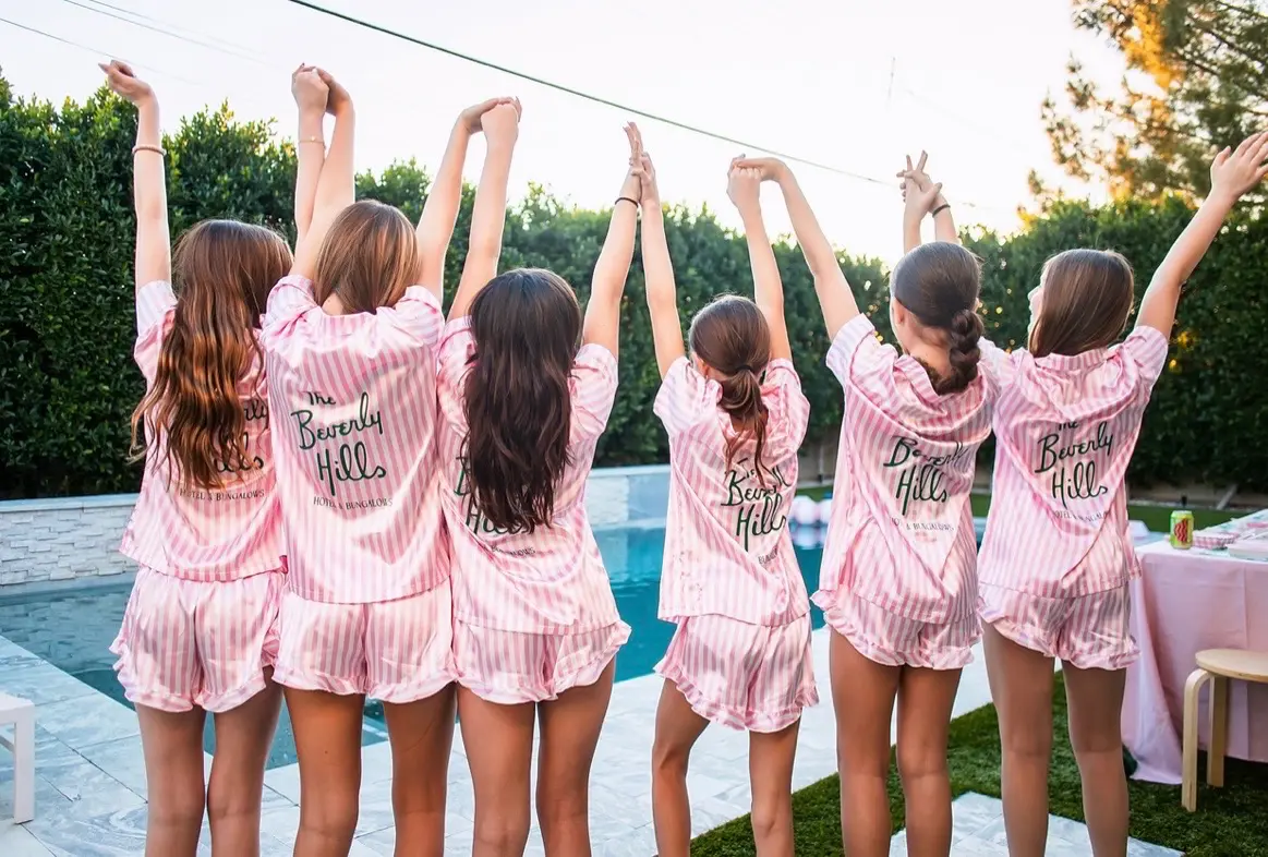 Poolside girls in matching pink pajamas