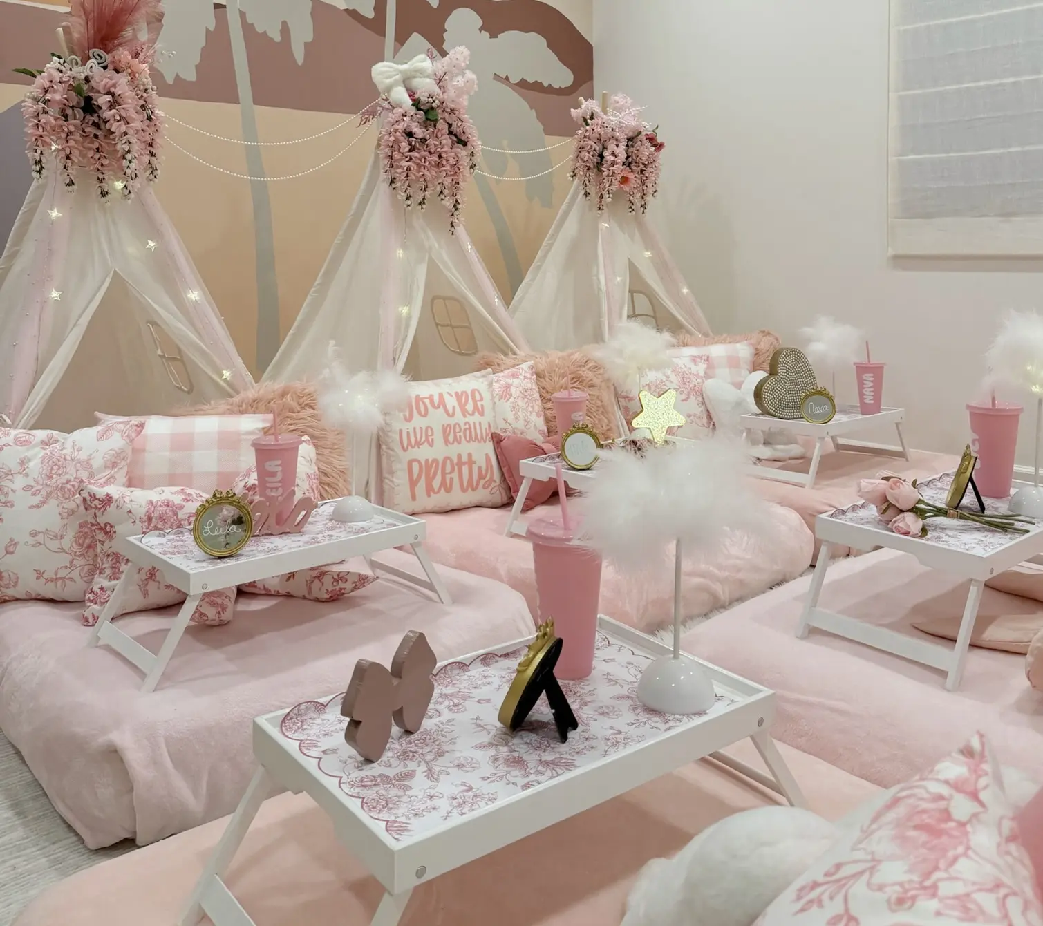 Pink princess sleepover teepee party setup