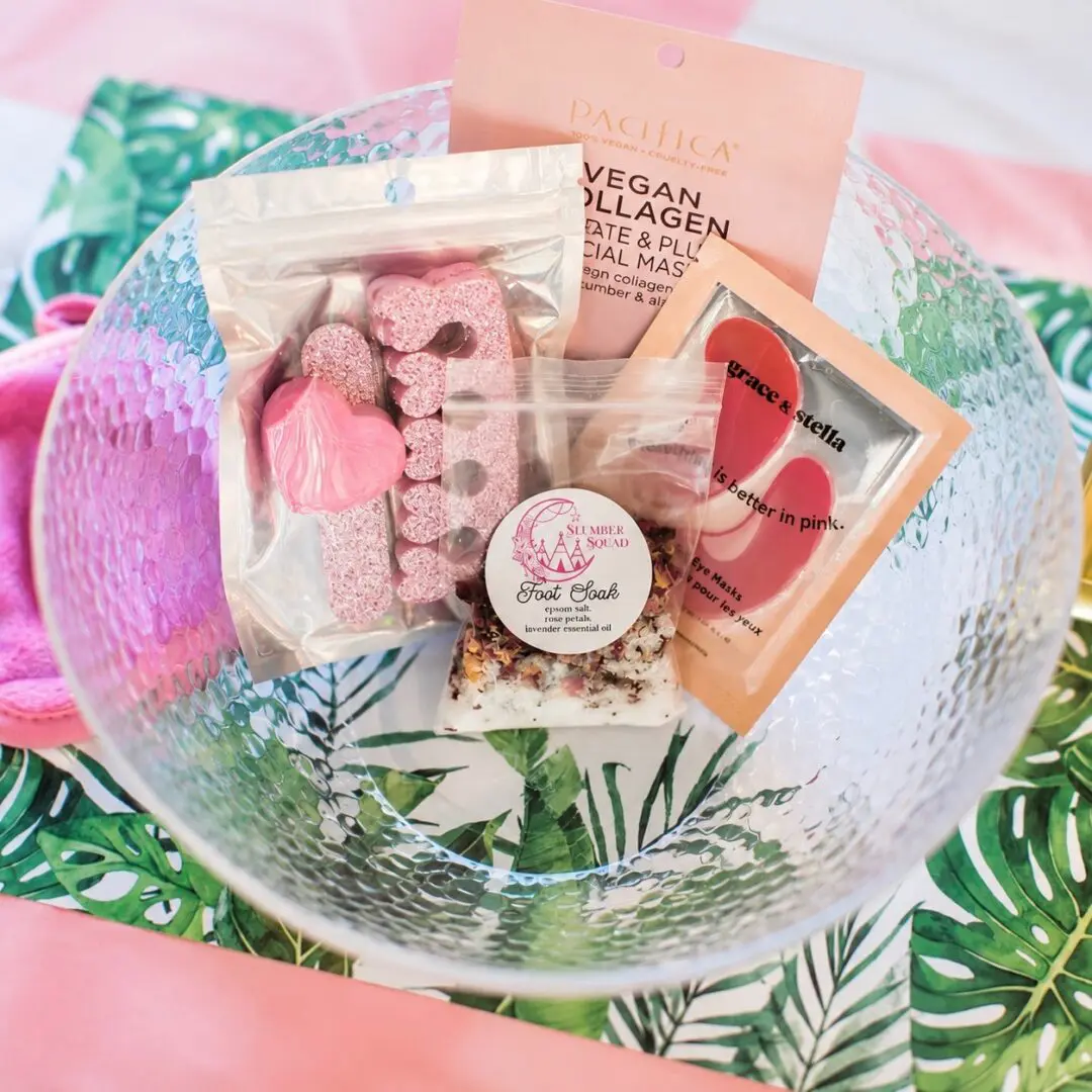 Spa gift bowl with pink bath and skincare