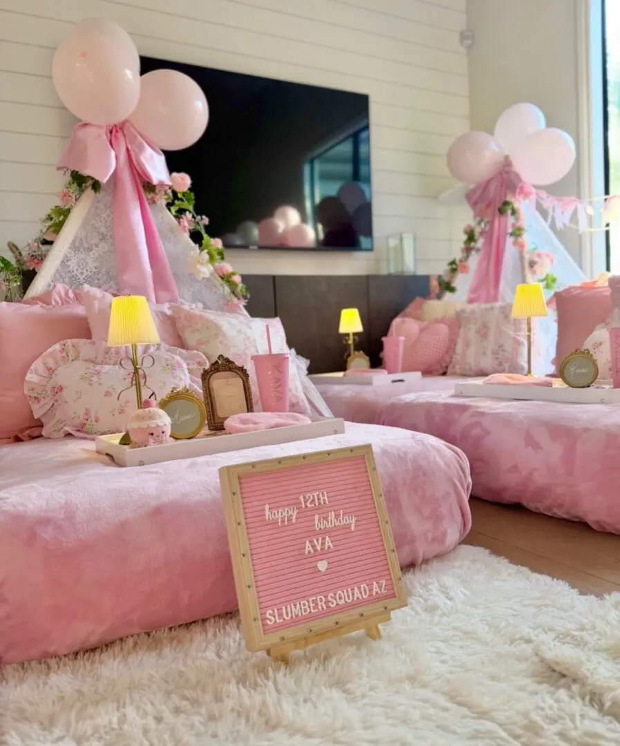 Pink slumber party tents with balloons