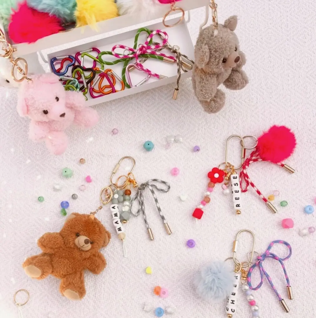 Cute plush teddy keychains with colorful charms