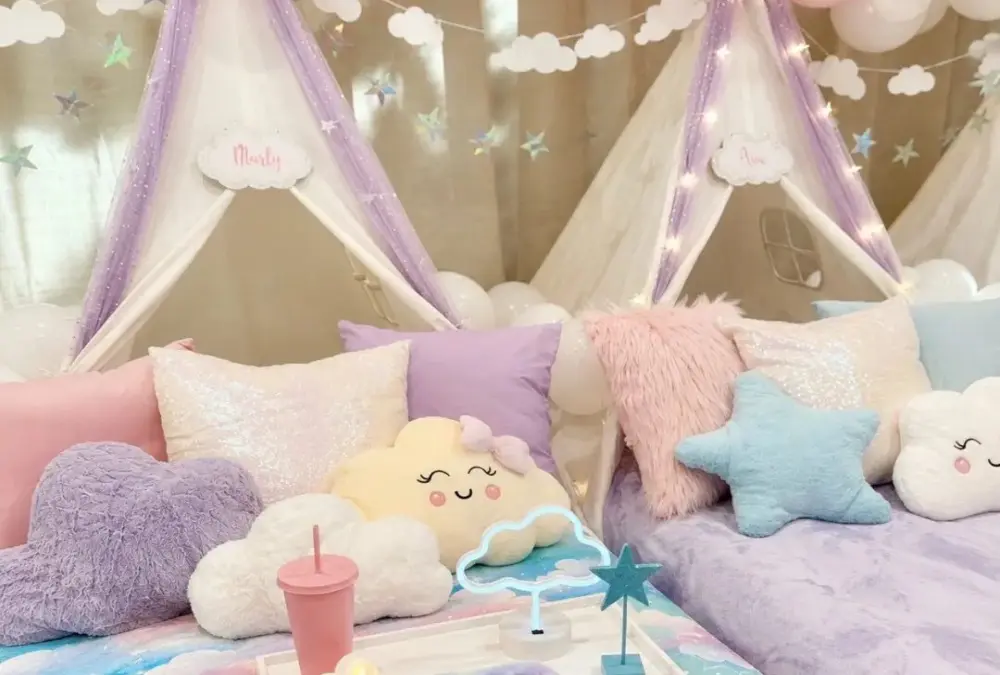 Pastel indoor teepee sleepover with cloud pillows