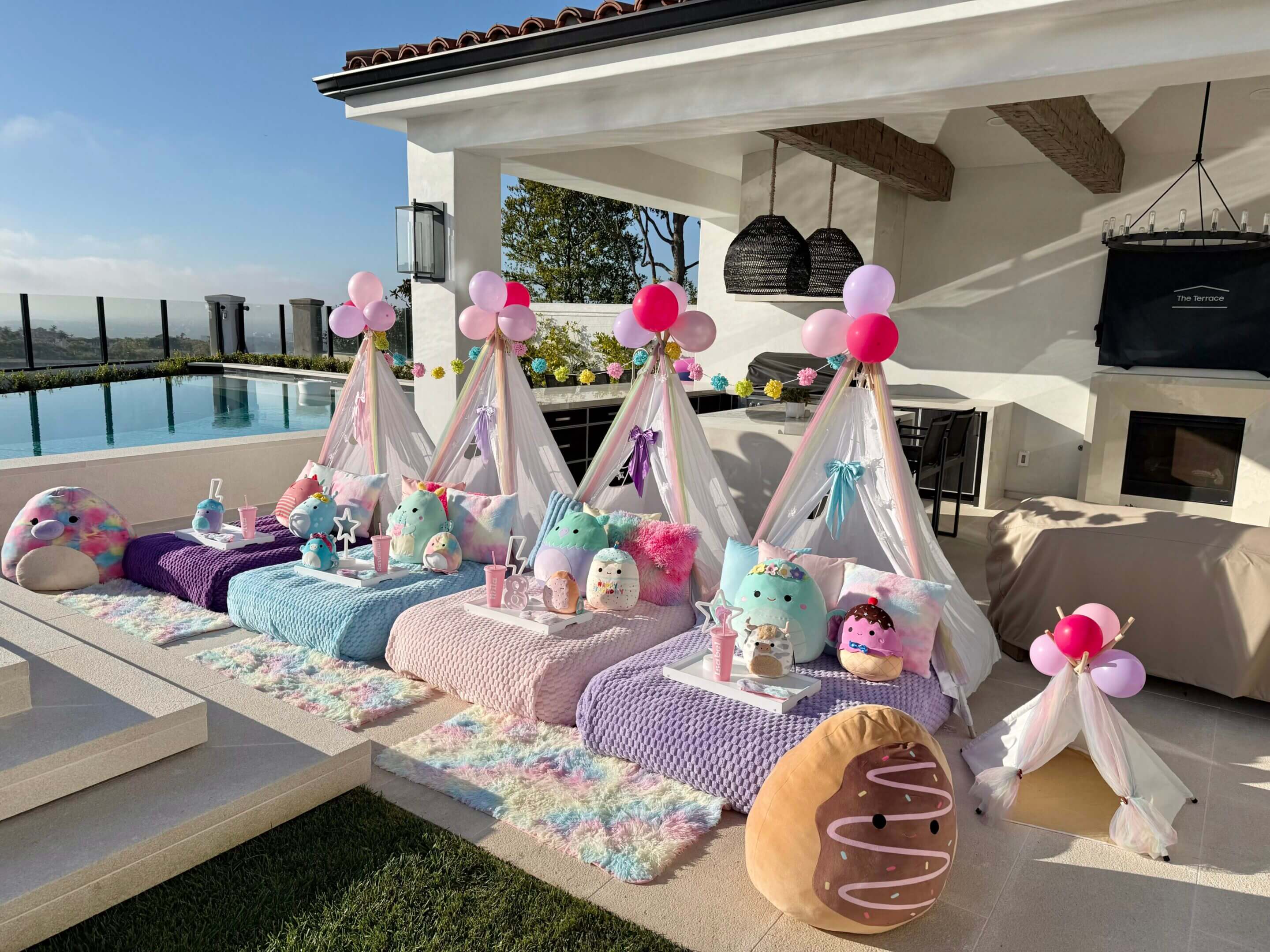 Poolside pastel teepees with plush toys