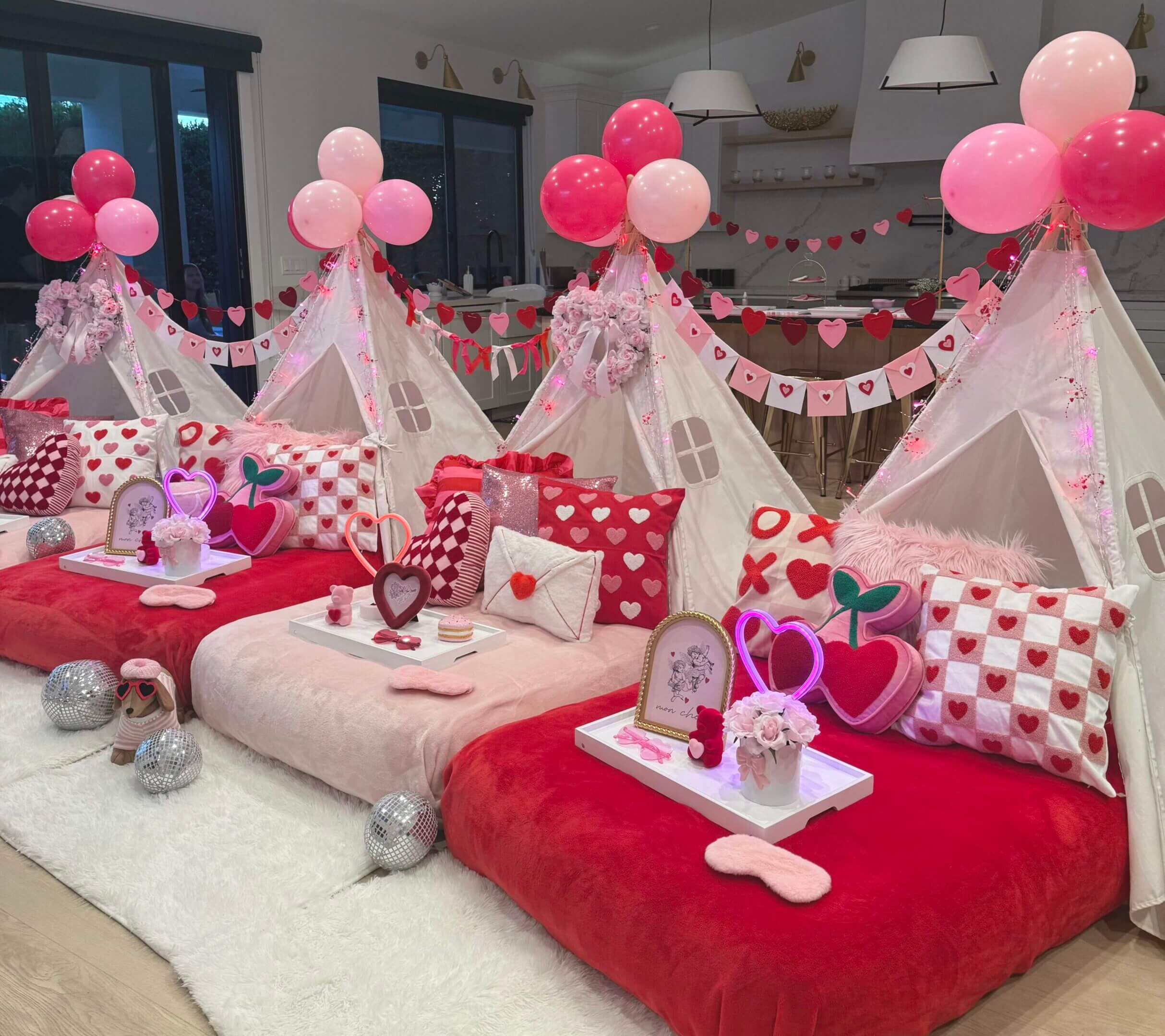 Valentine's heart-themed sleepover tent setup