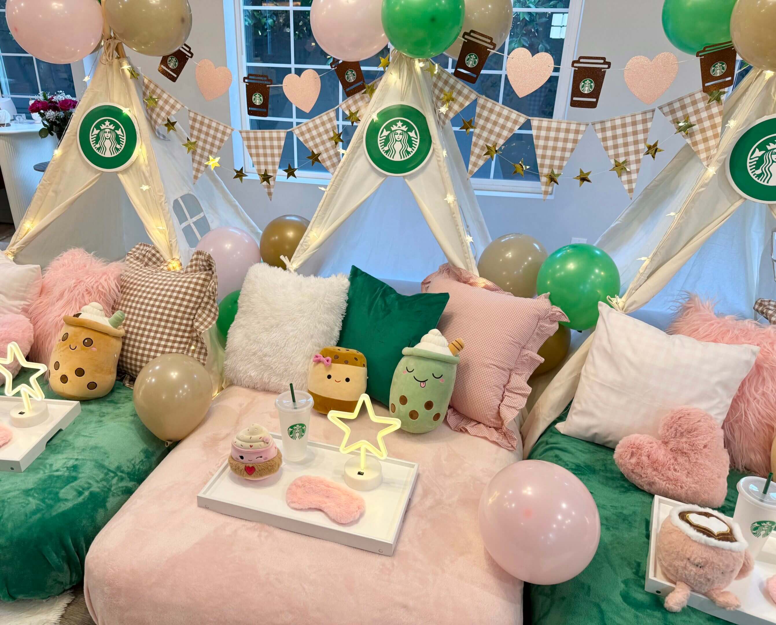 Cozy pastel teepee sleepover with Starbucks decor