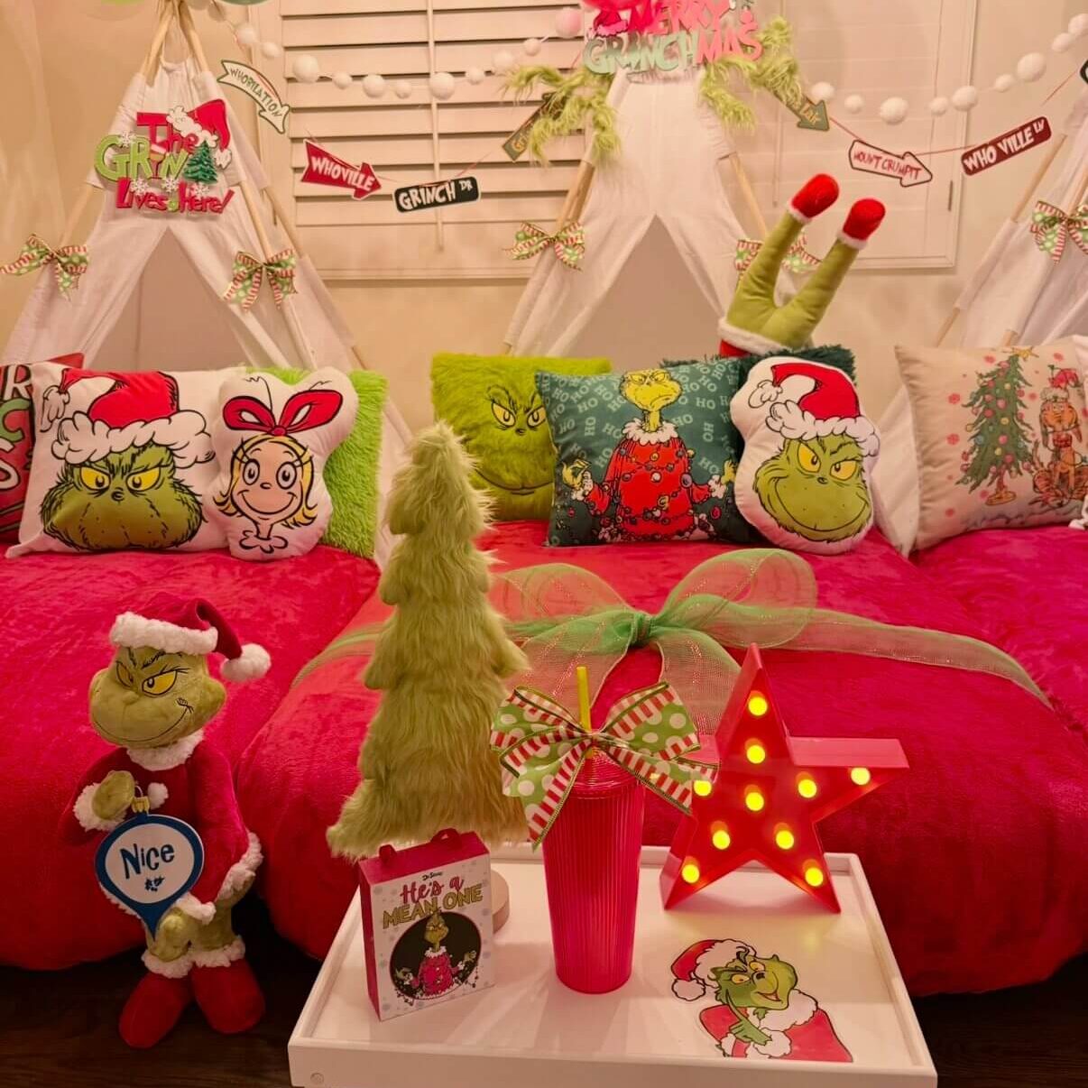 Grinch-themed Christmas bedroom with festive decor